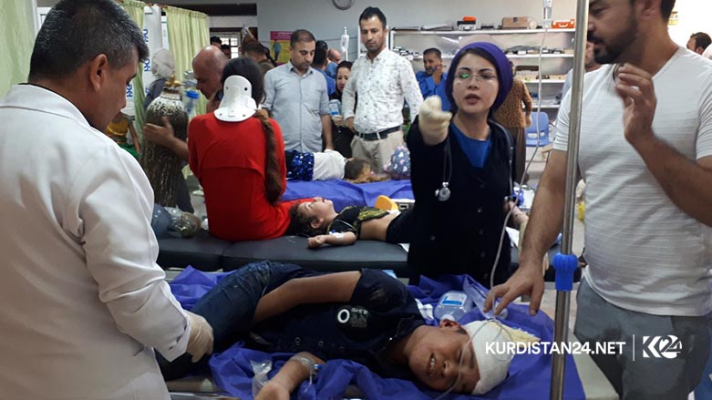 A mini bus carrying two Iraqi tourist families drove off a mountainous road in the Kurdistan Region, killing and injured tens of people  Aug. 30, 2019. (Photo: Kurdistan 24/Karwan Yara)